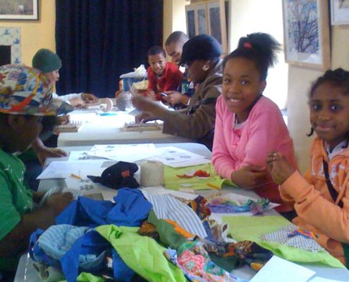 Children making fabric collages at an OSH after school program